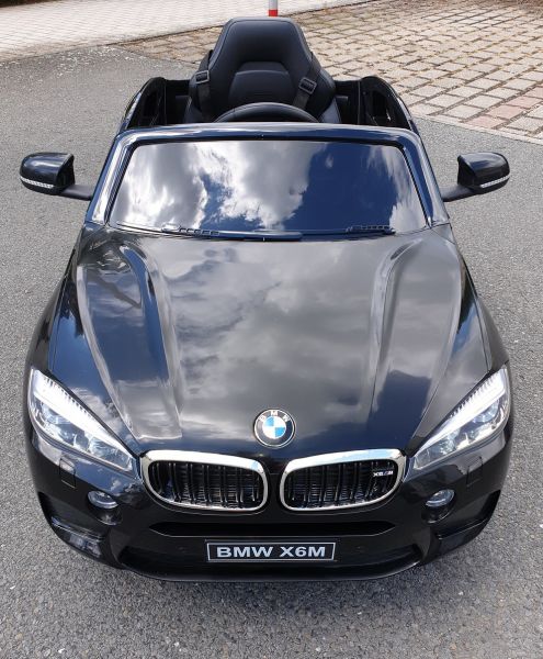 Kinderfahrzeug elektrisch BMW X6M 12V Kinder Elektro Auto mit 2 Akkus in schwarz